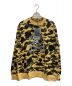 A BATHING APE（アベイシングエイプ）の古着「SKULL APE CAMO SWEAT」｜イエロー