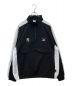 PUMA（プーマ）の古着「T7 HALF ZIP WOVEN JACKET 825503-01　」｜ブラック×ホワイト