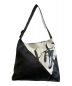 Y's（ワイズ）の古着「LOGO CALLIGRAPHY PRINT LEATHER BAG」