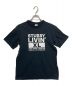 stussy（ステューシー）の古着「プリントTシャツ」｜ブラック