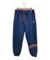 Patagonia（パタゴニア）の古着「LINE LOGO RIDGE STRIPE UPRISAL SWEATPANTS」｜ネイビー