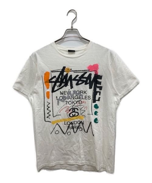 stussy（ステューシー）stussy (ステューシー) ワールドツアープリント Tシャツ ホワイト サイズ:Mの古着・服飾アイテム