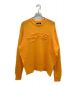 stussy（ステューシー）の古着「LOOSE KNIT LOGO SWEATER」｜オレンジ