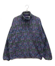 Patagonia（パタゴニア）の古着「90sテウェルチェ柄シンチラスナップT」｜パープル×ネイビー