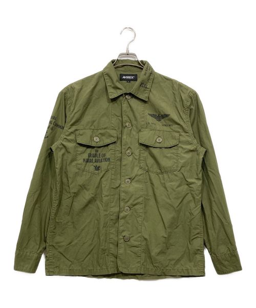 AVIREX（アヴィレックス）AVIREX (アヴィレックス) US NAVY グラフィックプリント ファティーグシャツ オリーブ サイズ:Lの古着・服飾アイテム