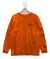 CarHartt（カーハート）の古着「HP X CARHARTT LS T-SHIRT」｜オレンジ