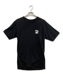 stussy（ステューシー）の古着「プリントTシャツ」｜ブラック