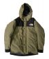 THE NORTH FACE（ザ ノース フェイス）の古着「マウンテンダウンジャケット」｜オリーブ