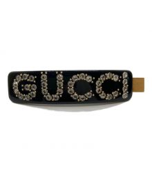 GUCCI（グッチ）の古着「ラインストーンロゴクリップ」｜ブラック