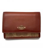 COACHコーチ）の古着「2つ折り財布」｜ブラウン