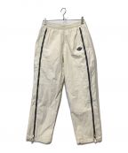 unknownアンノーン）の古着「Cream Tonal Zip Track Pants」｜アイボリー