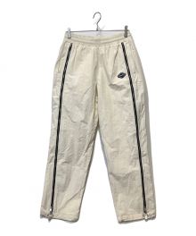 unknown（アンノーン）の古着「Cream Tonal Zip Track Pants」｜アイボリー