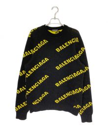 BALENCIAGA（バレンシアガ）の古着「ALL OVER LOGO JACQUARED KNIT」｜ブラック×イエロー