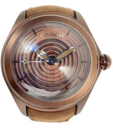 CORUM（コルム）の古着「パブルオプティカルアートリミテッド Ref.082 311 98 0062 OP01R」｜ブラウン