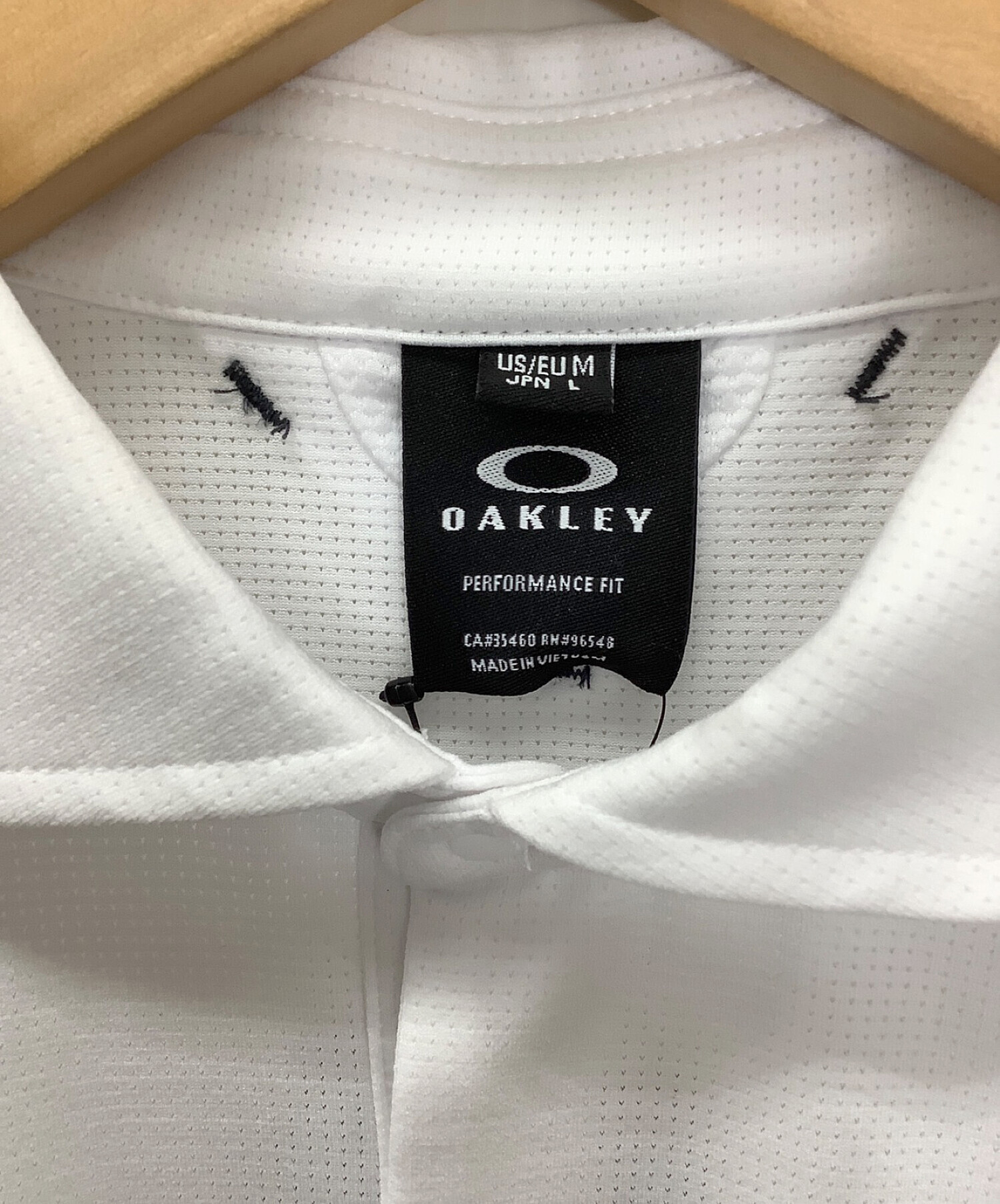 OAKLEY (オークリー) ポロシャツ ホワイト サイズ:L 未使用品