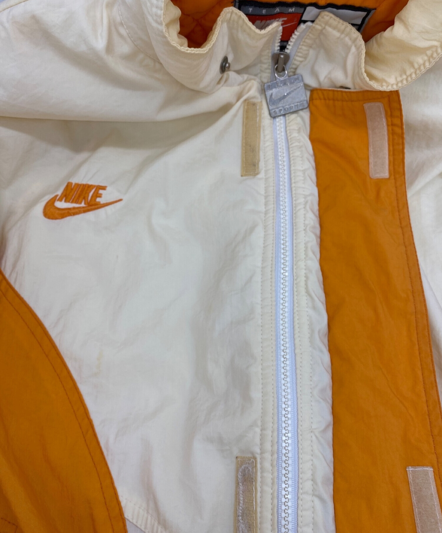 中古・古着通販】NIKE (ナイキ) カレッジ中綿ジャケット オレンジ