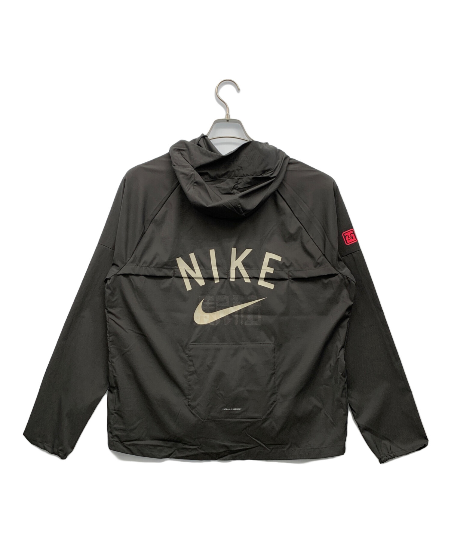 Nike swoosh packable jacket online