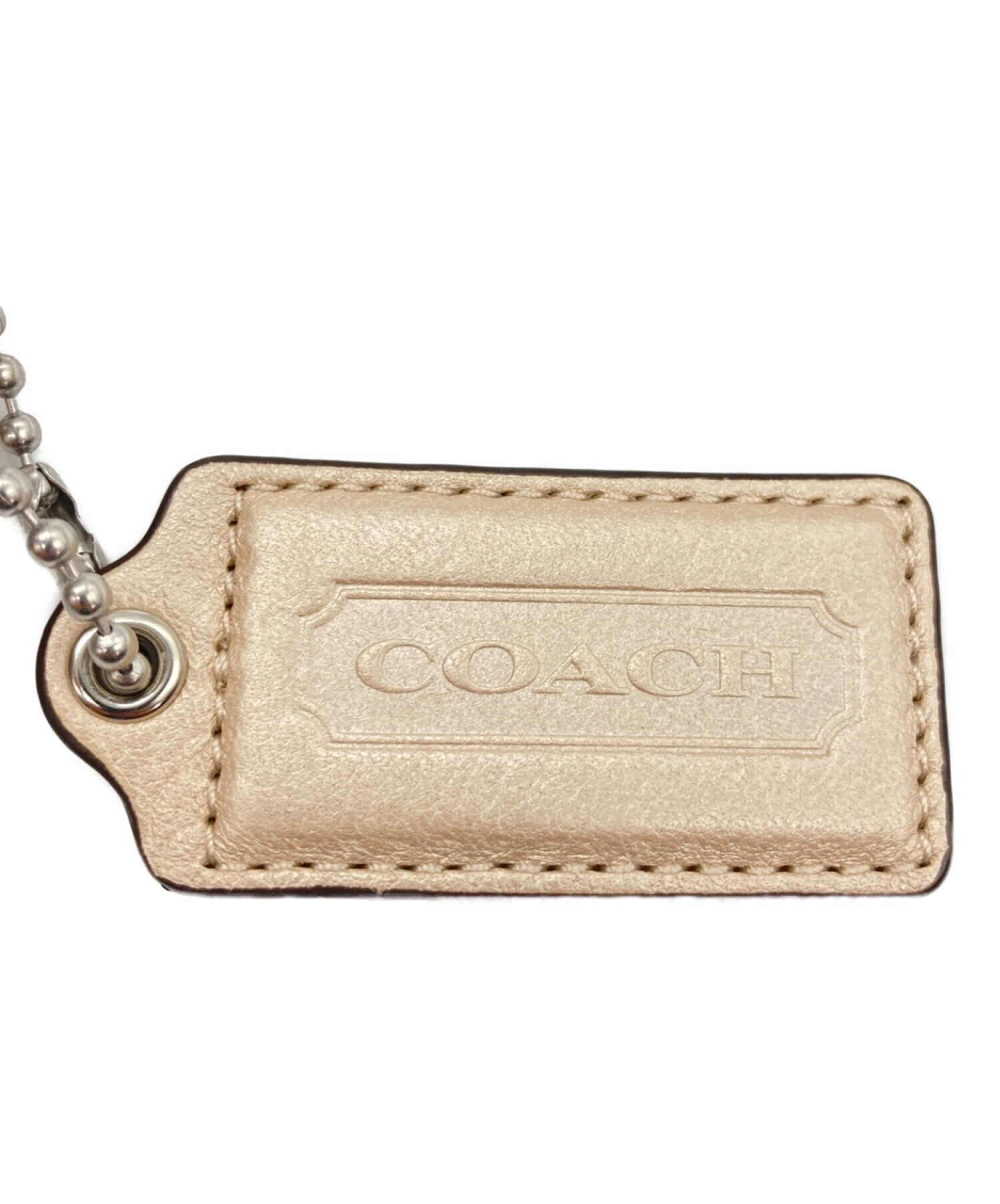 Coach best sale leather tag