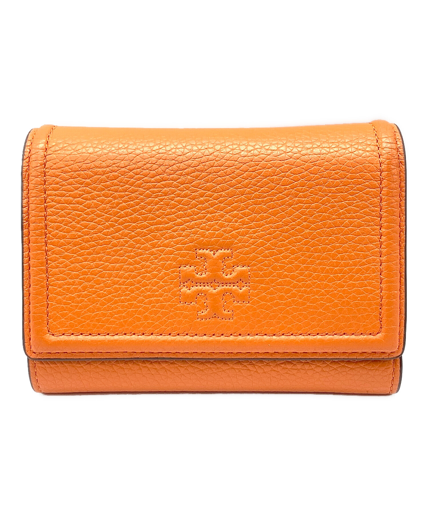 トリーバーチのオレンジ三つ折り財布 - 折り財布