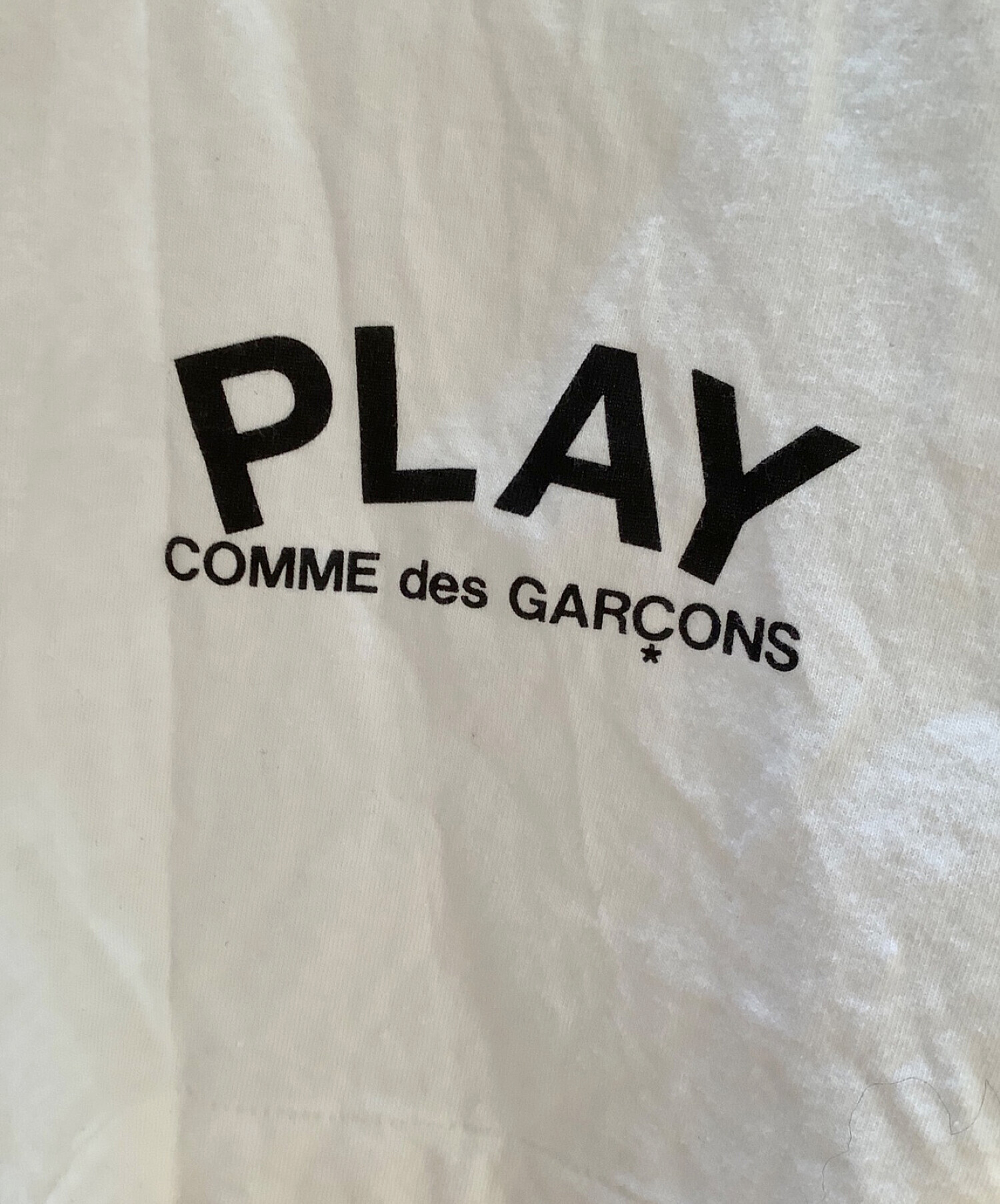 Comme des outlet garcon tag