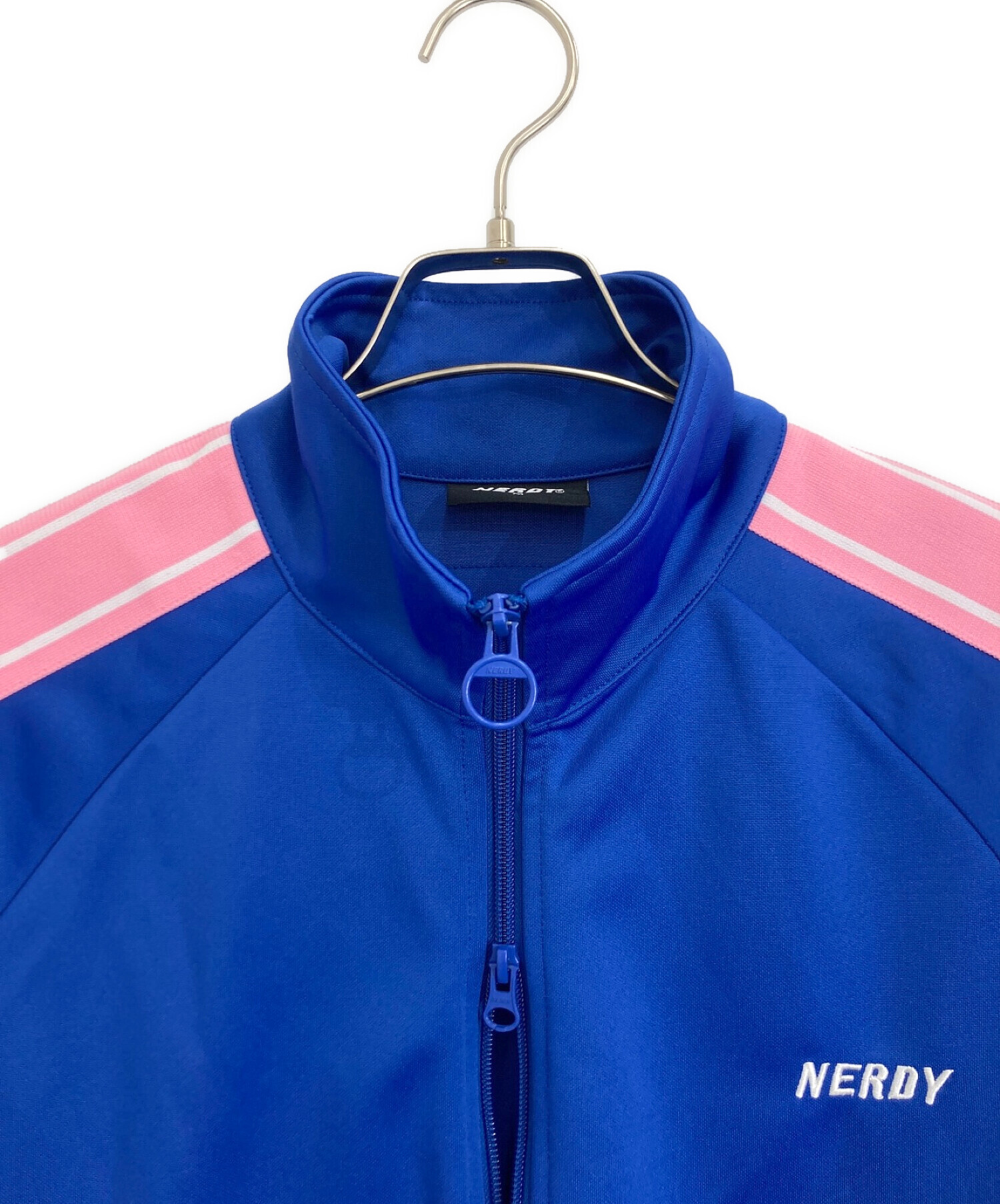NERDY (ノルディ) NERDY(ノルディ) ジップアップ パレット トラック トップ ブルー×ピンク サイズ:M