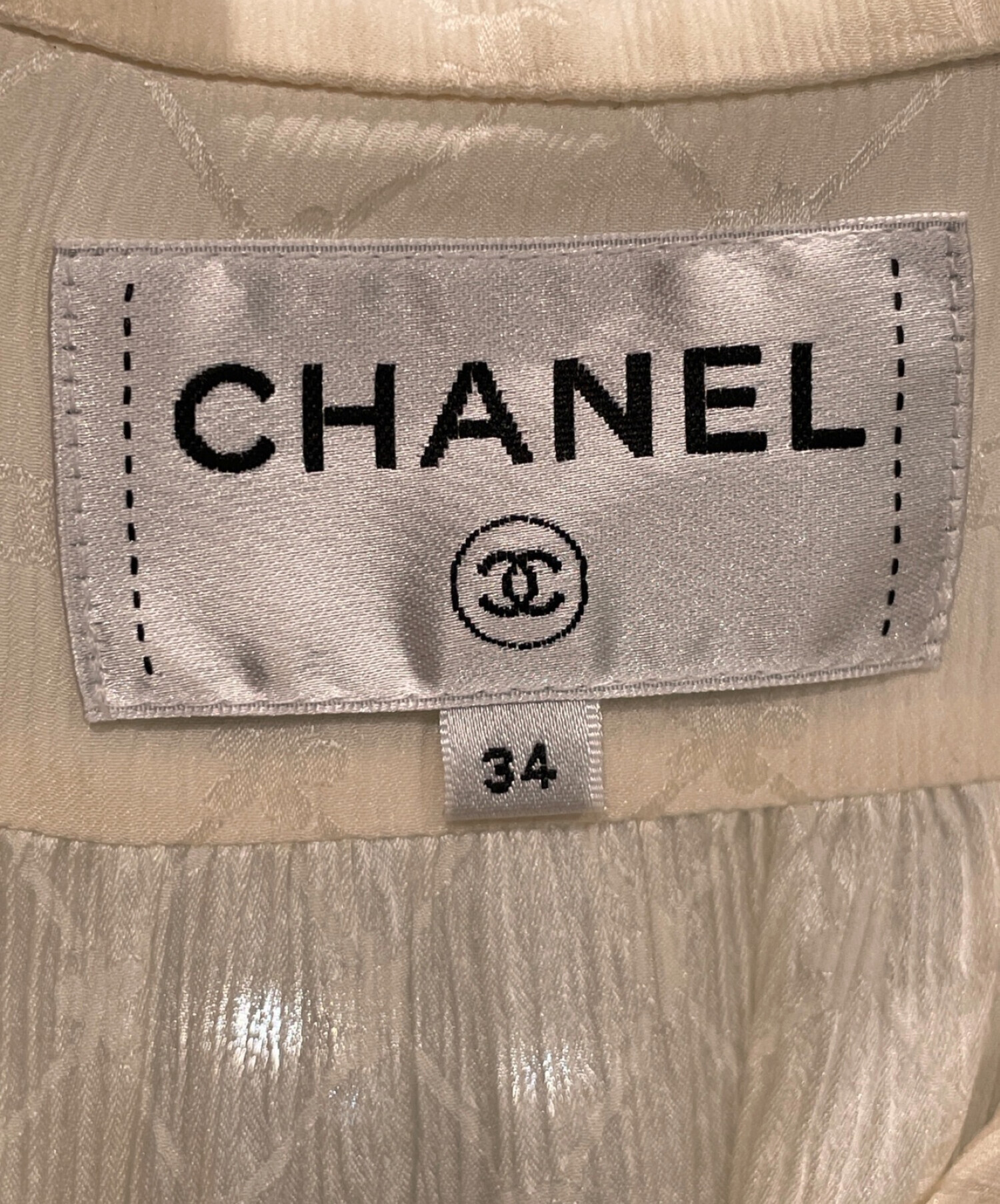 中古・古着通販】CHANEL (シャネル) Coco Button Silk Blouse ホワイト サイズ:34｜ブランド・古着通販  トレファク公式【TREFAC FASHION】スマホサイト