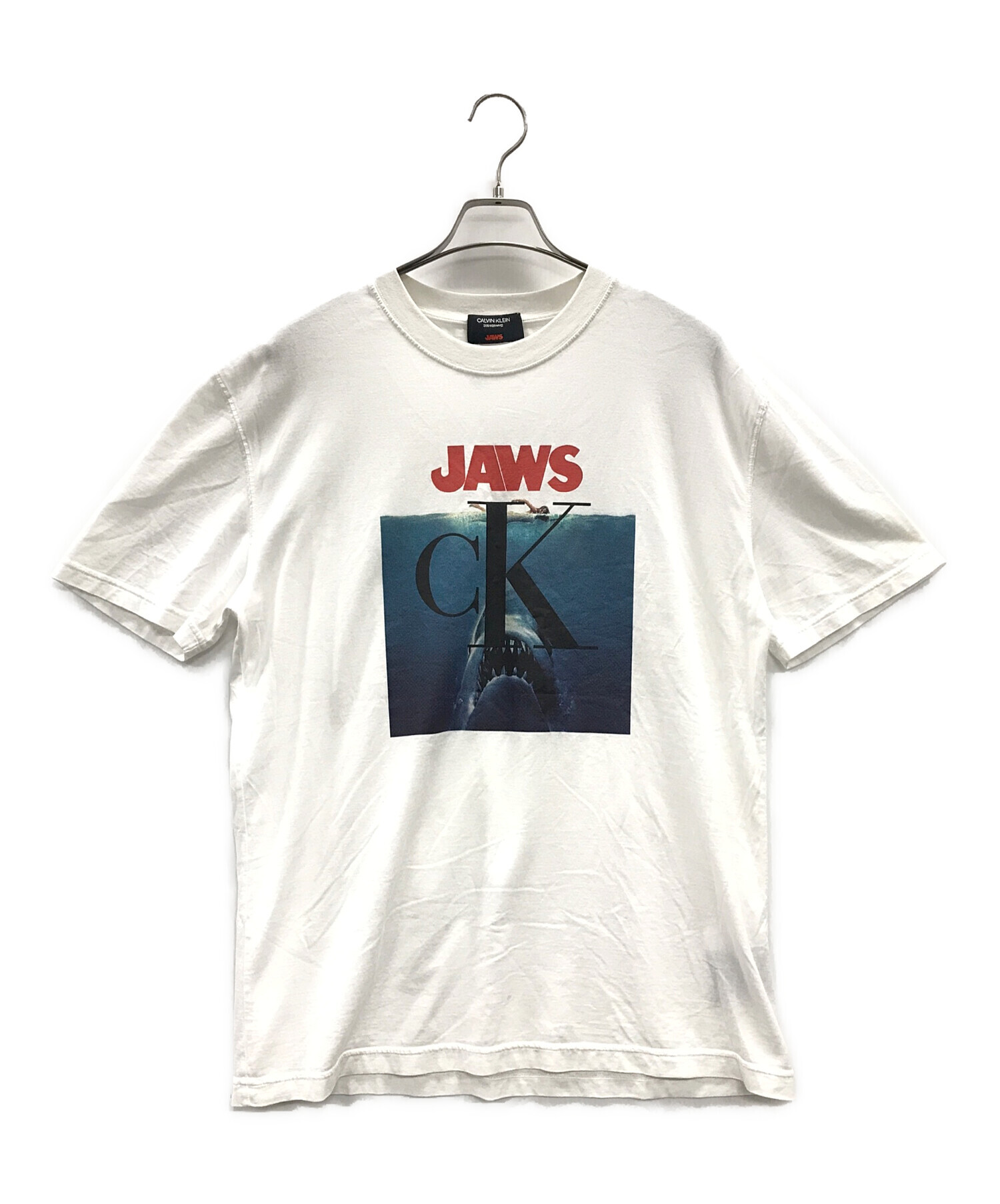 中古・古着通販】Calvin Klein (カルバンクライン) JAWS (ジョーズ) Tシャツ ホワイト サイズ:S｜ブランド・古着通販  トレファク公式【TREFAC FASHION】スマホサイト