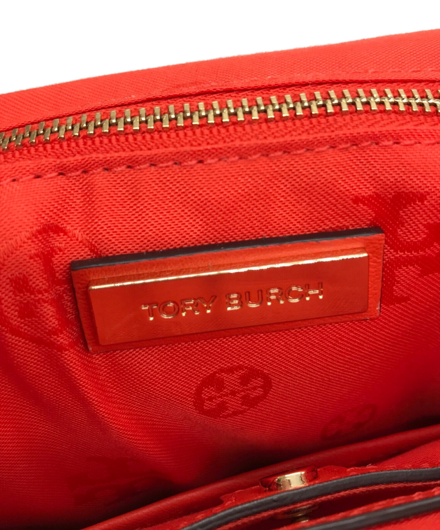 TORY BURCH (トリーバーチ) レザーリュック オレンジ