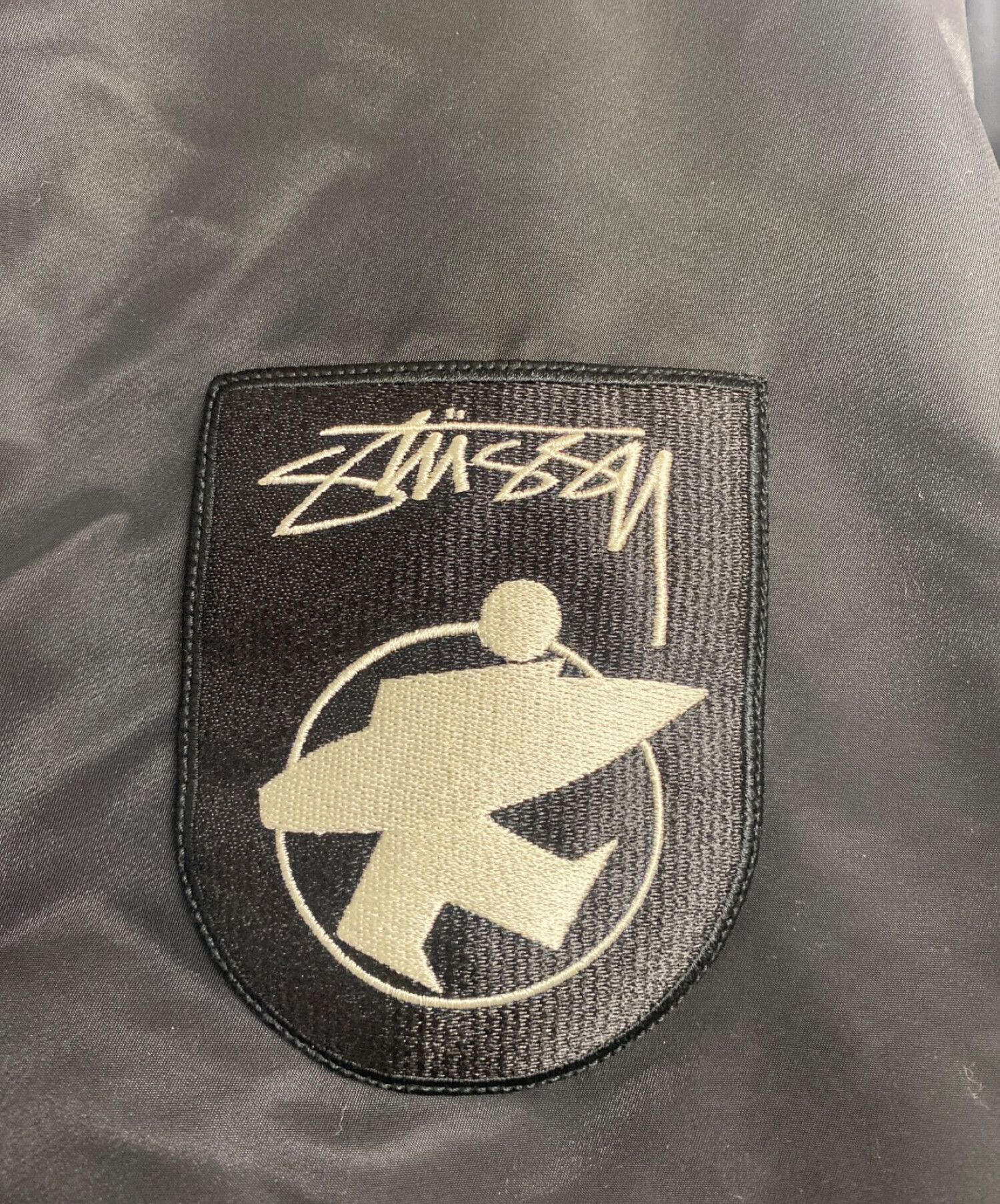 stussy (ステューシー) サーフマンワッペンスタジャン ブラック サイズ:M