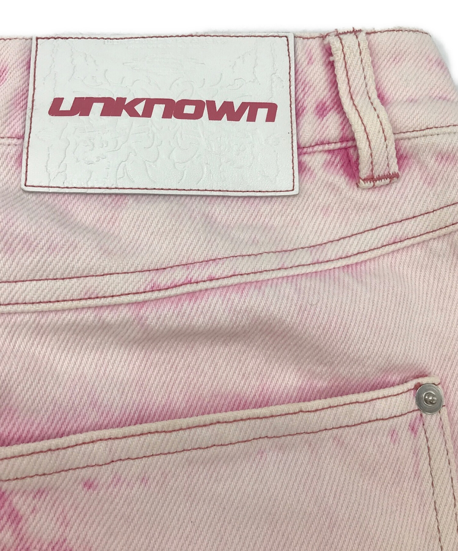 UNKNOWN LONDON (アンノウンロンドン) ウォッシュドエンジェルグラフィックデニム ピンク サイズ:M