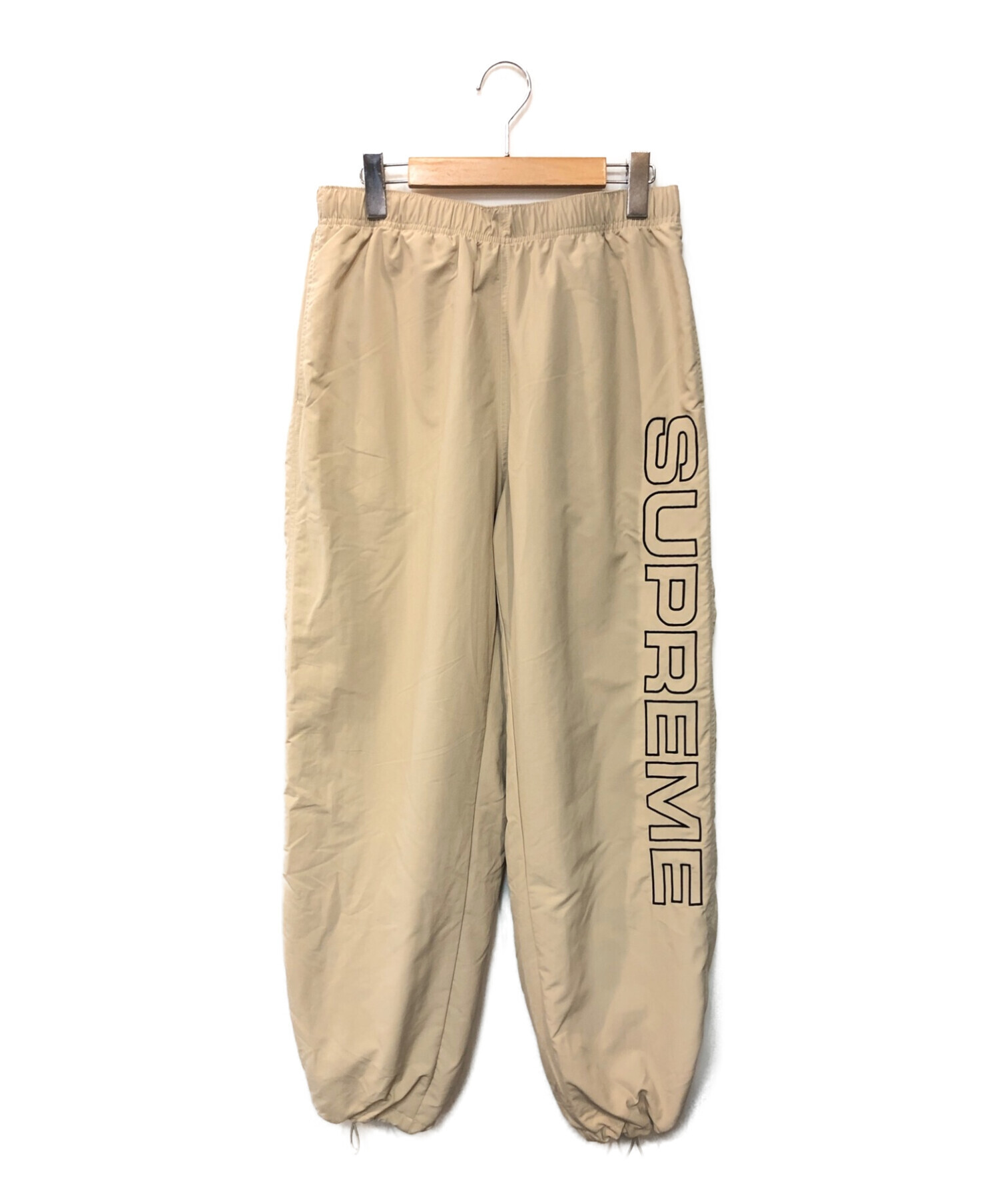 supreme Spellout Embroidered Track Pantタグ