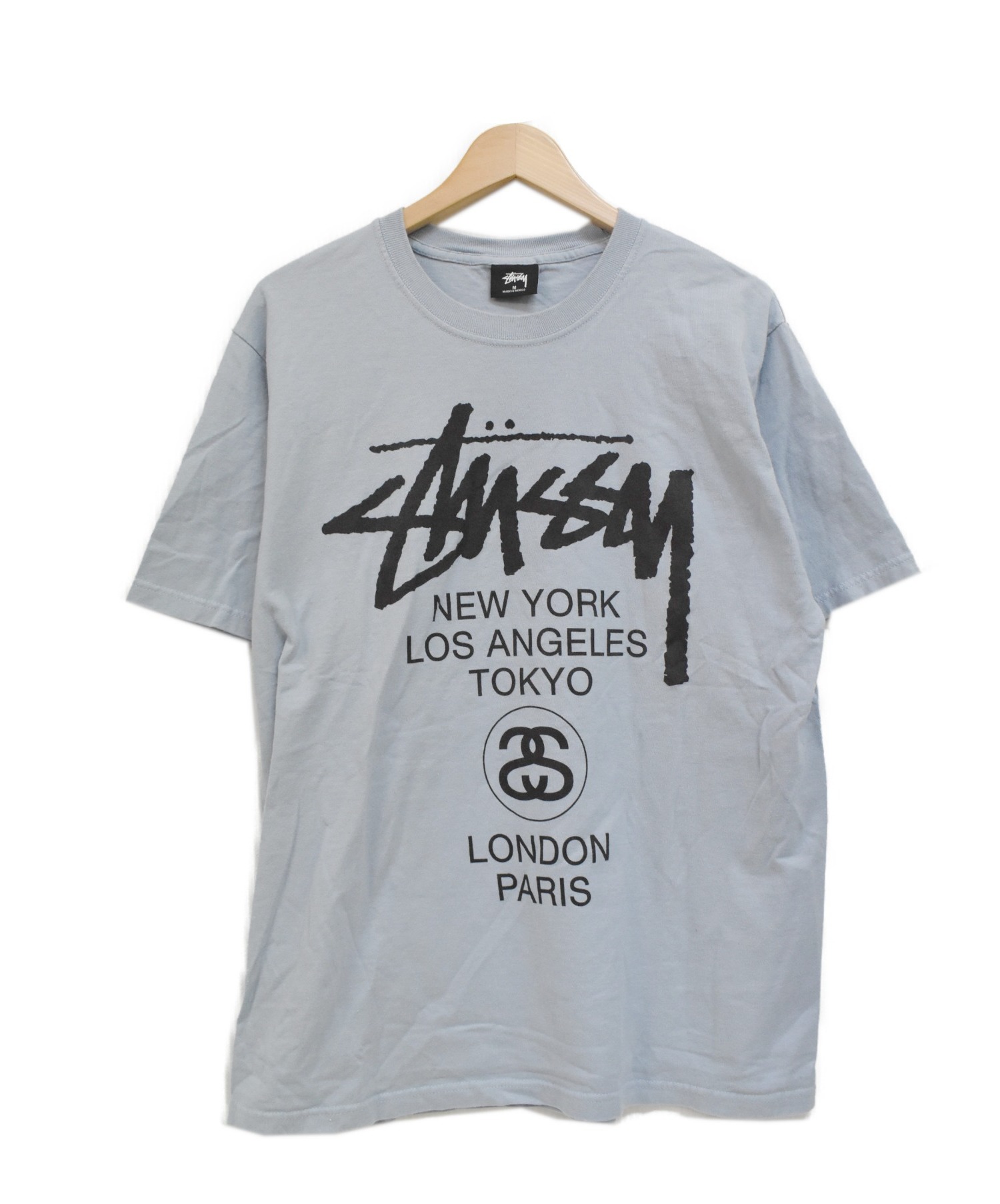 stussy (ステューシー) ワールドツアープリントTシャツ スカイブルー サイズ:M