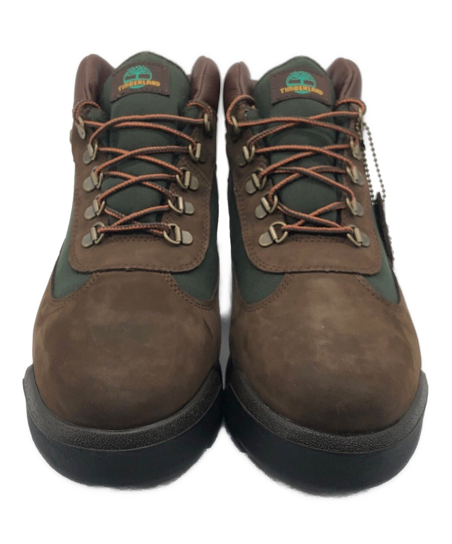 green and brown timberland field boots