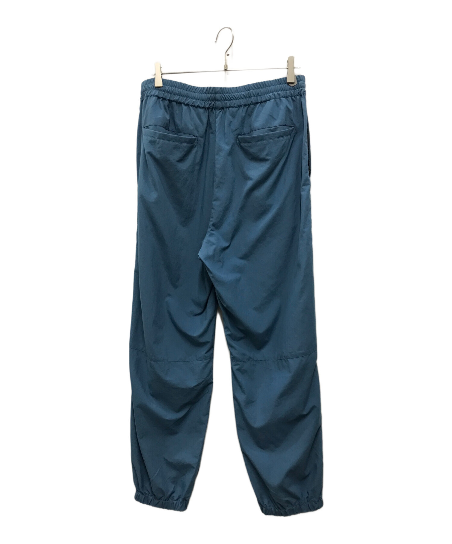 中古・古着通販】UNIVERSAL PRODUCTS. (ユニバーサルプロダクツ) NYLON SHELL TRACK PANTS ブルー  サイズ:3｜ブランド・古着通販 トレファク公式【TREFAC FASHION】スマホサイト