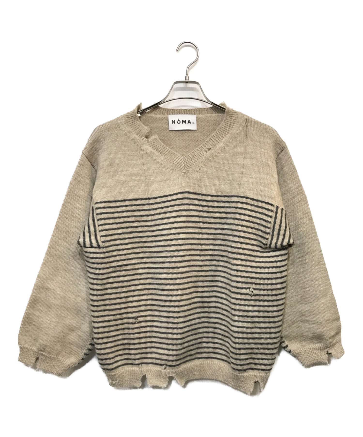 ダメージ加工の入ったニットですDamage Stripe Sweater noma