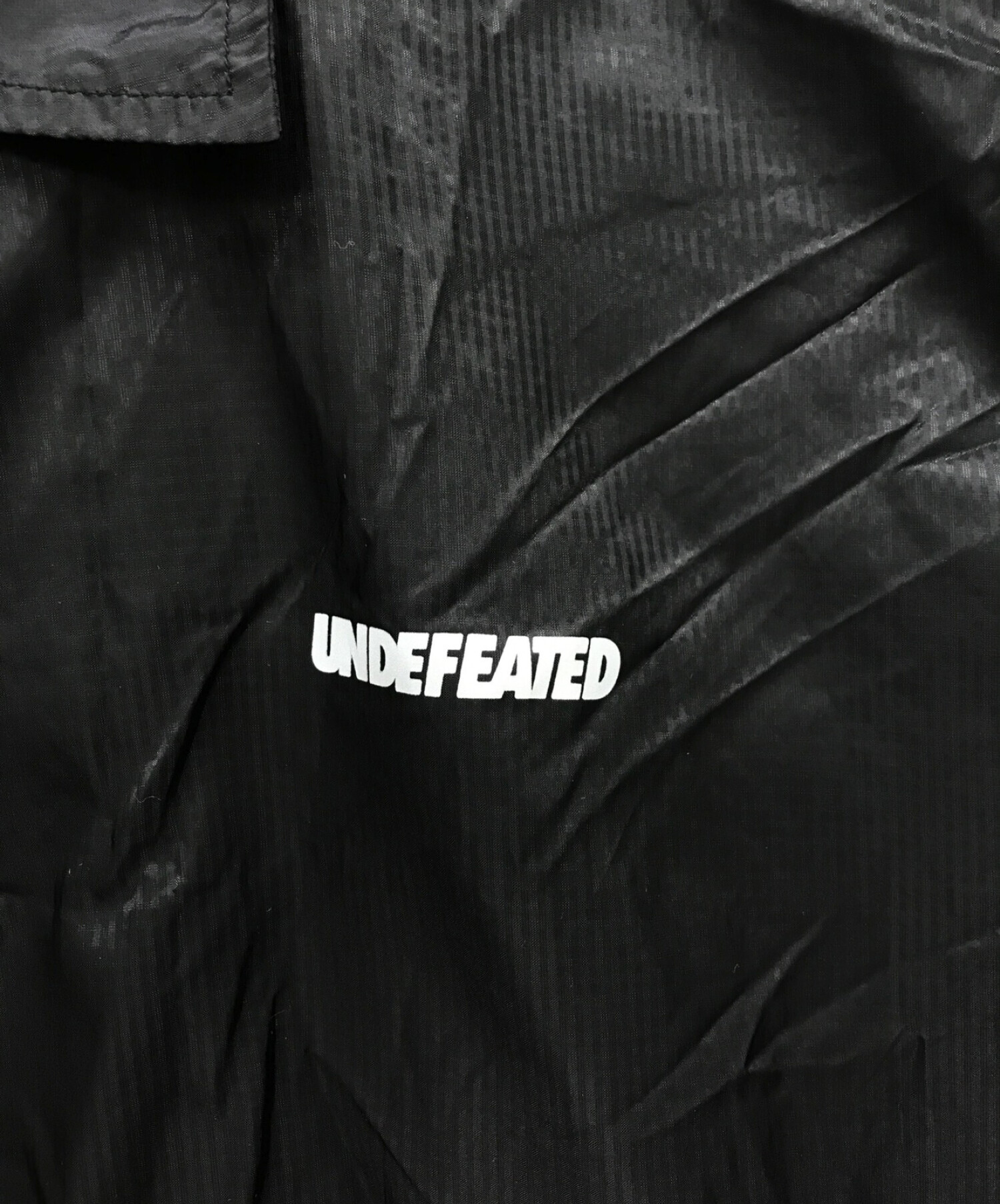 UNDEFEATED (アンディーフィーテッド) コーチジャケット ブラック サイズ:M