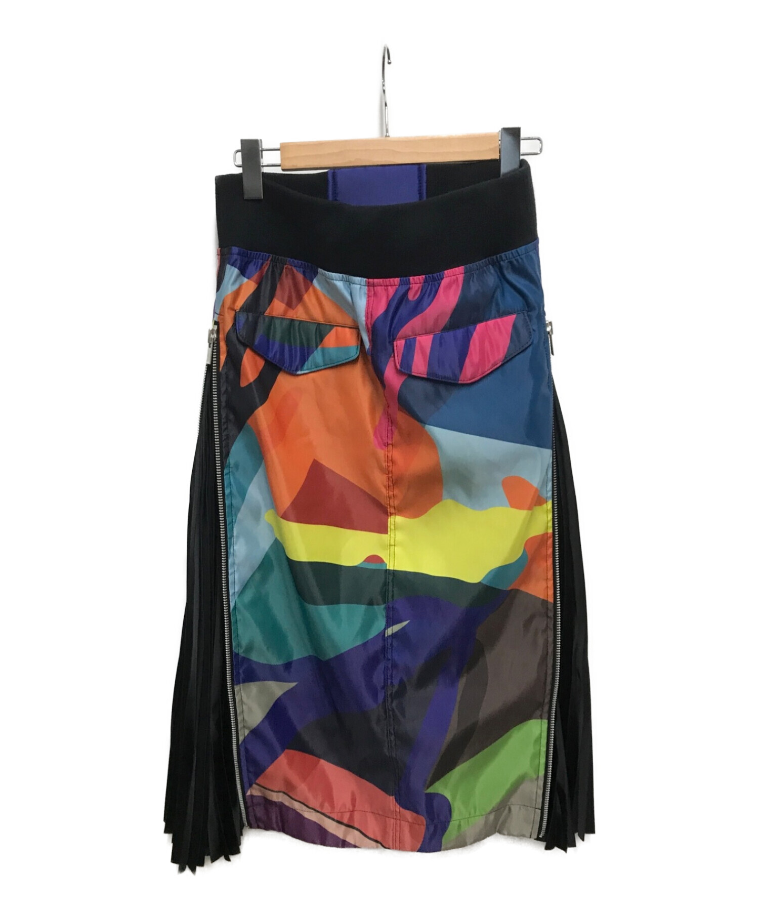 sacai (サカイ) KAWS (カウズ) ジップアッププリーツコラボスカート / zip-panel abstract skir ブルー サイズ:2