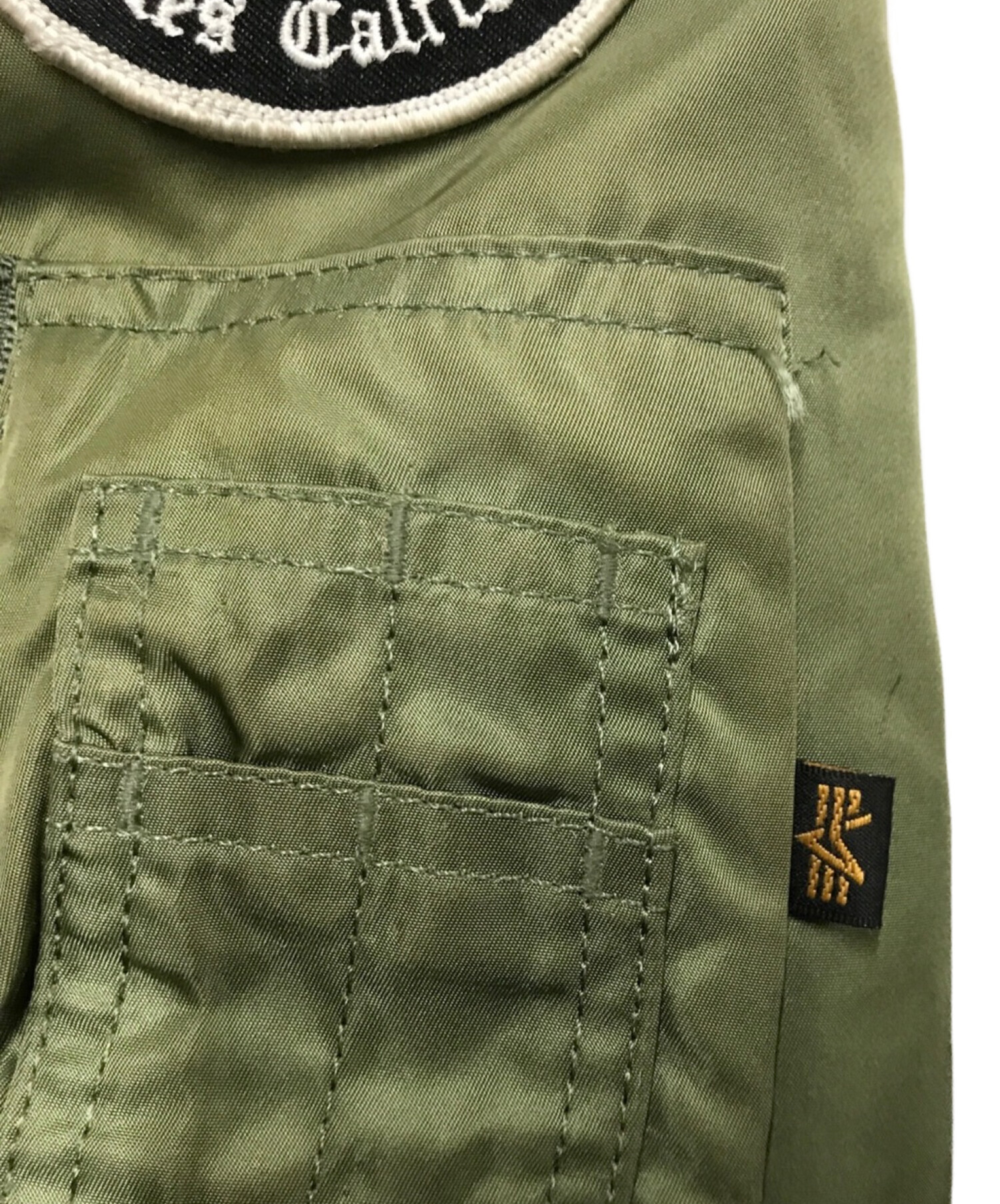 stussy (ステューシー) ALPHA (アルファ) FRAGMENT DESIGN (フラグメント デザイン) 25th  トリプルコラボMA1ジャケット オリーブ サイズ:L