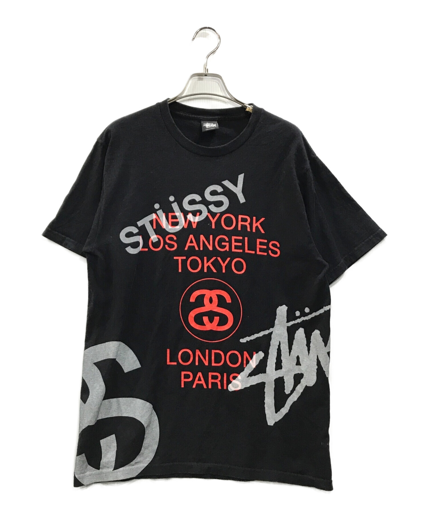 stussy (ステューシー) ワールドツアーロゴプリントTシャツ ブラック サイズ:M