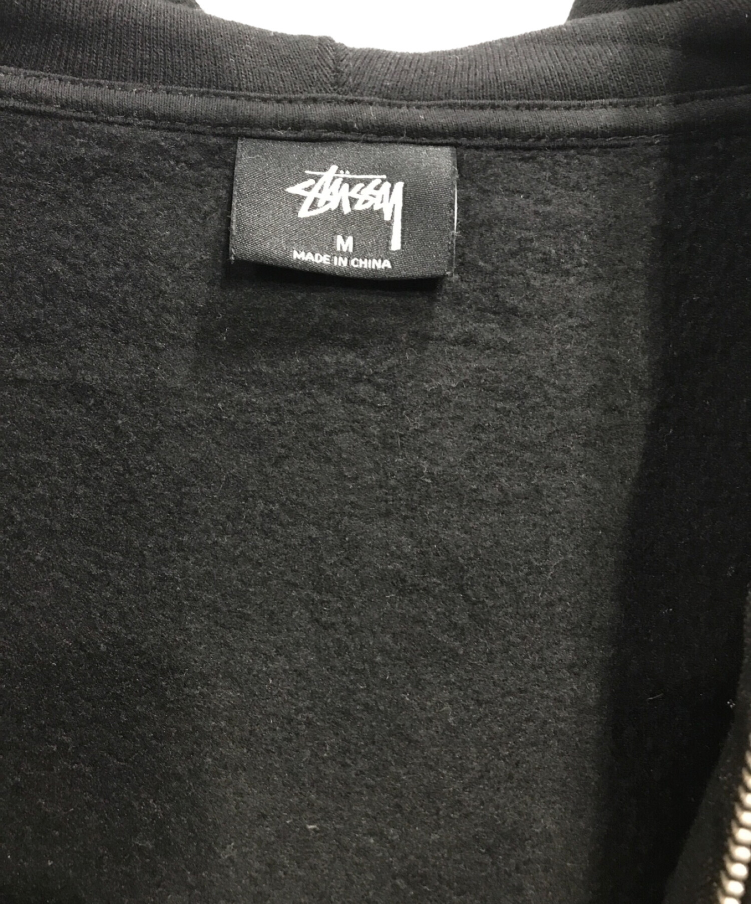 中古・古着通販】stussy (ステューシー) WORLD TOUR ZIP HOOD ロゴ