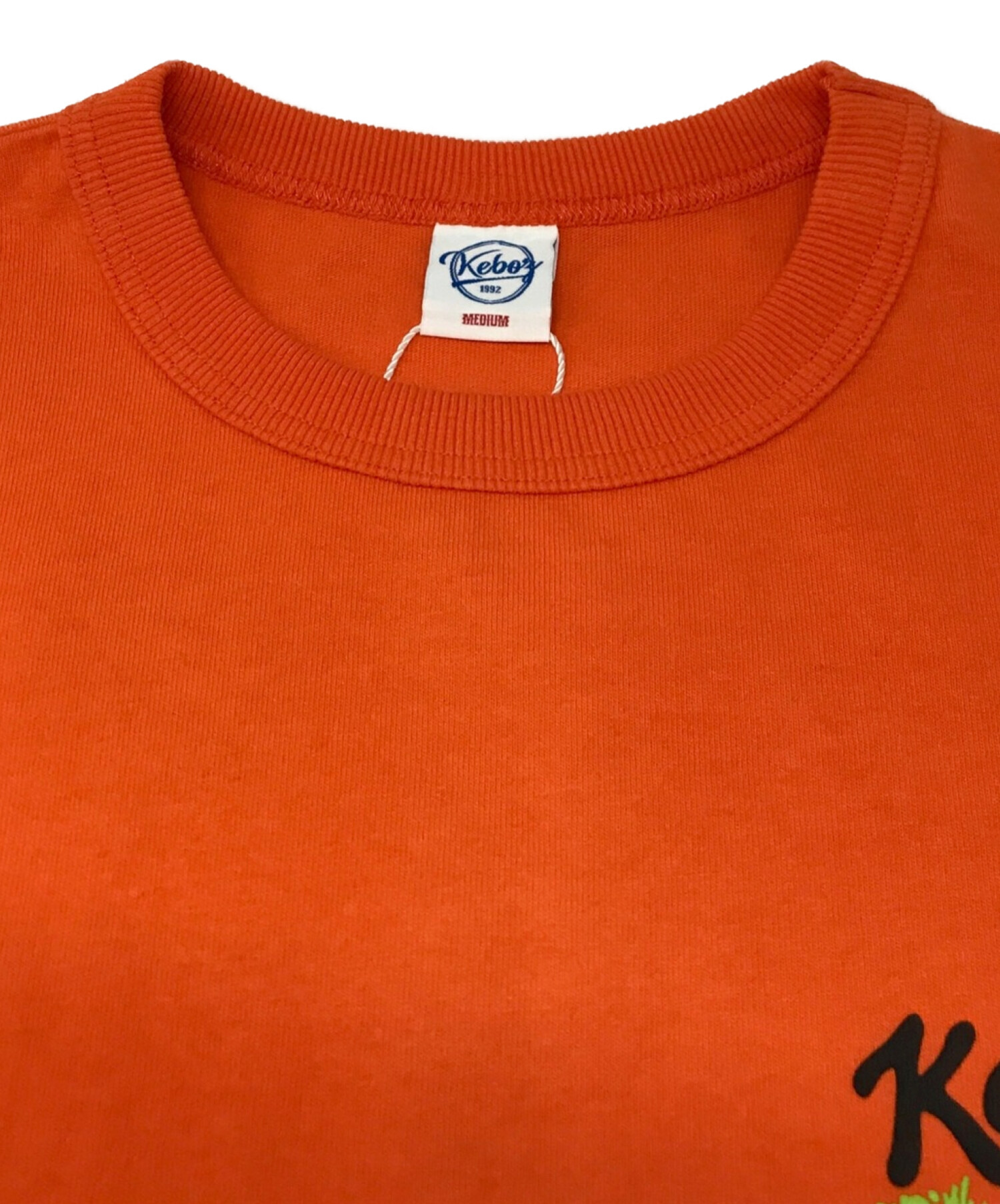 KEBOZ (ケボズ) バックプリント Tシャツ オレンジ サイズ:MEDIUM