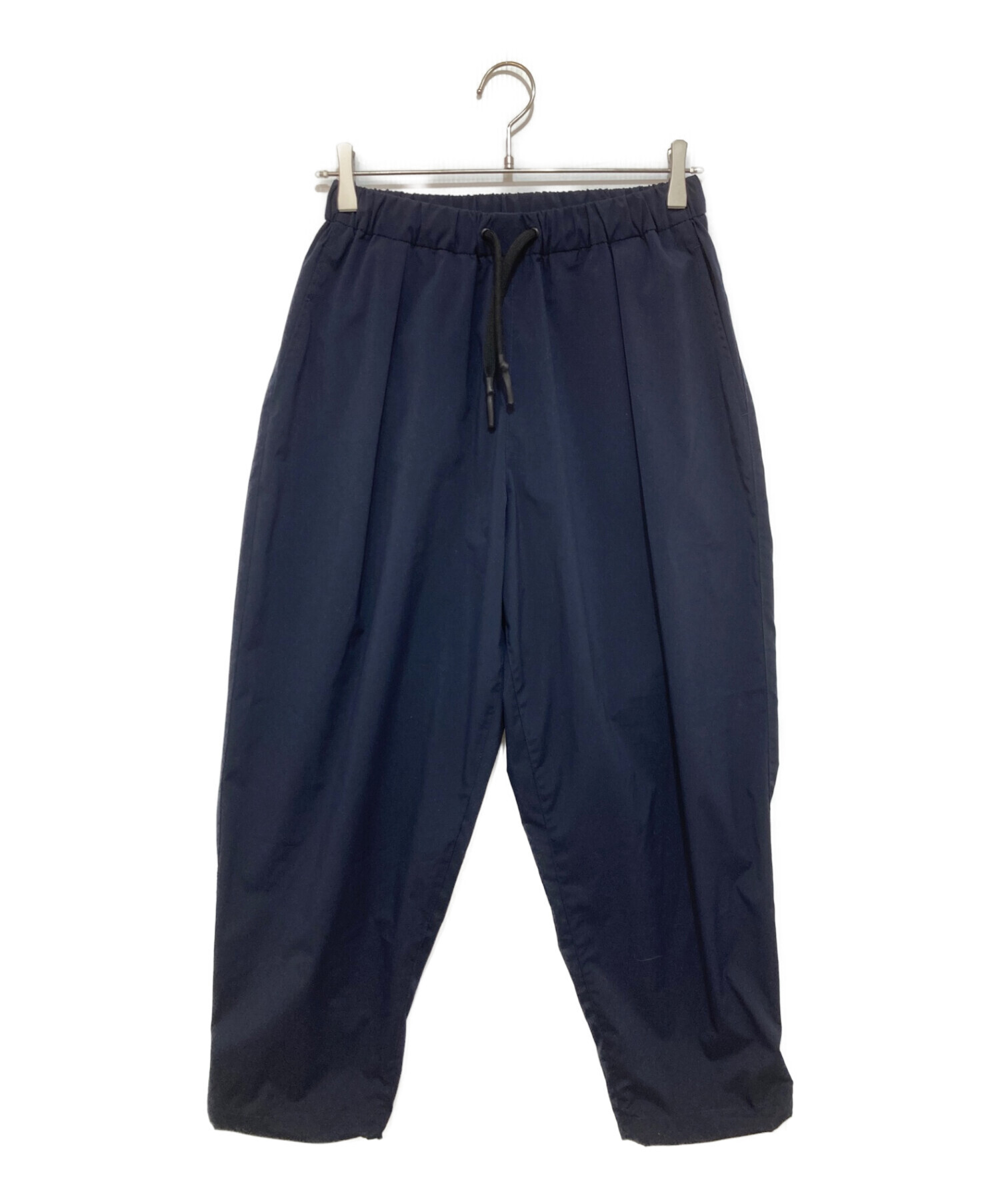 UNTRACE (アントレース) WATER REPELLENT TAPERED STRETCH TRACK PANTS ネイビー