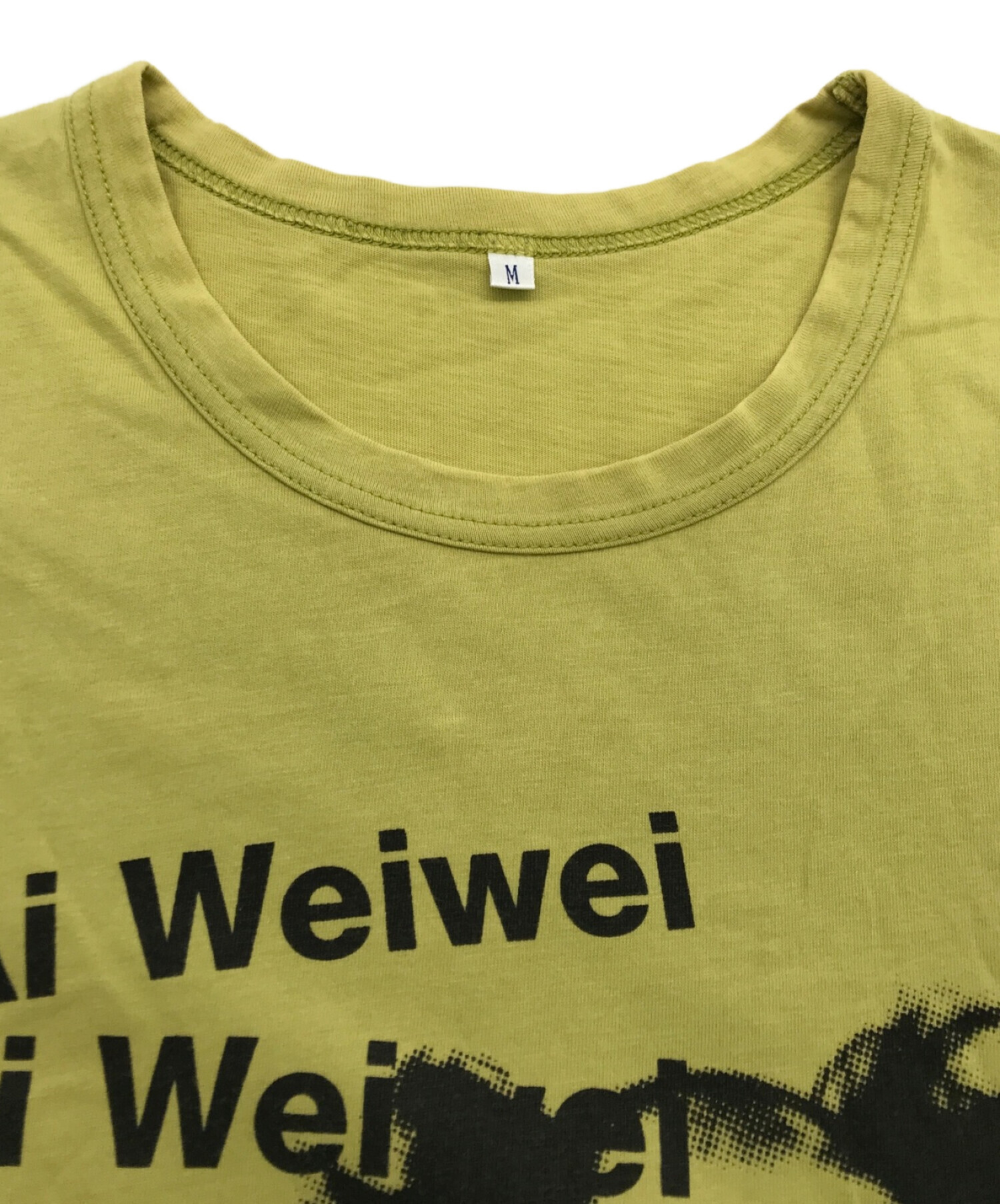 COMME des GARCONS (コムデギャルソン) Ai WeiWei (アイ・ウェイウェイ) プリントTシャツ イエロー サイズ:M