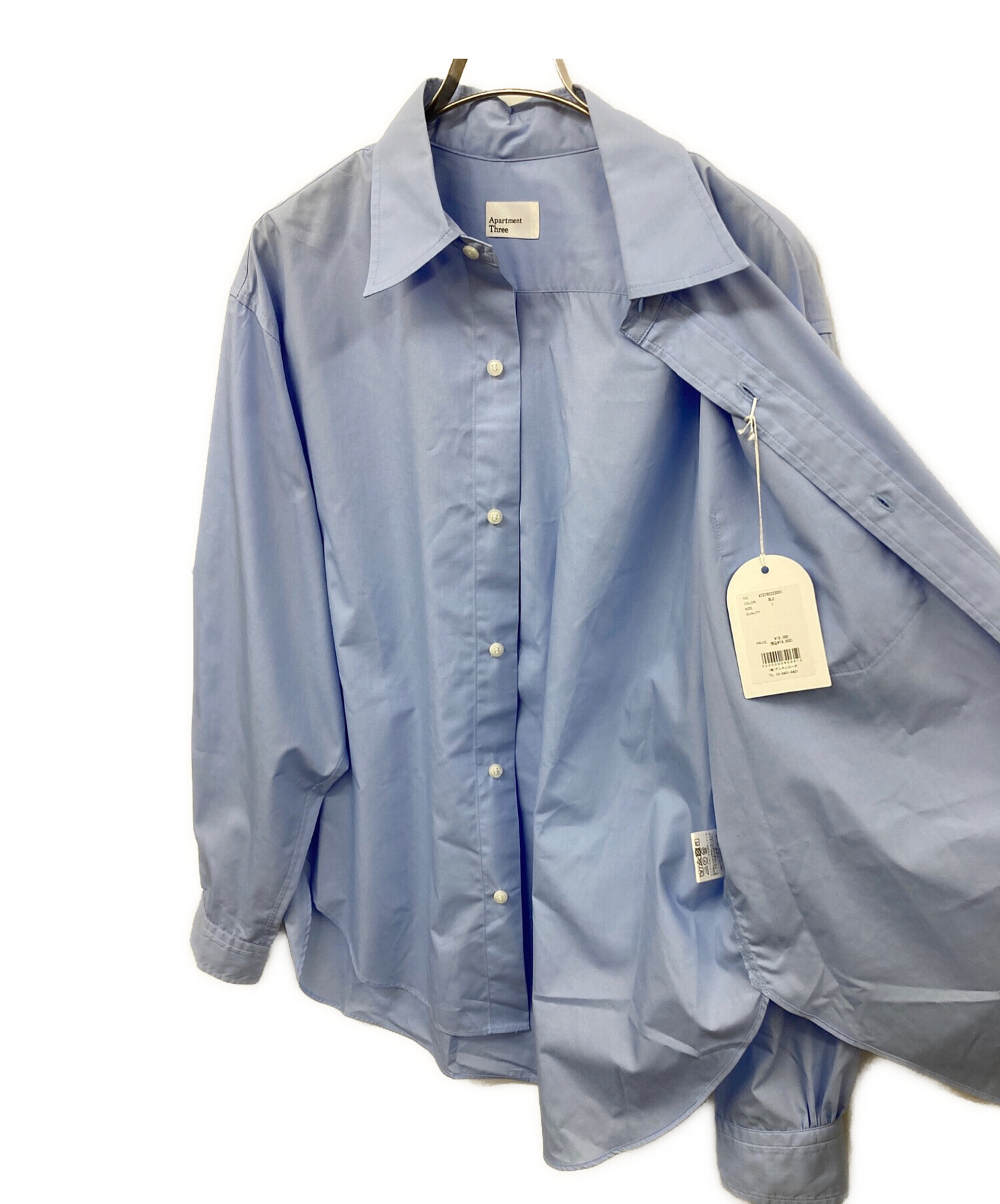 apartment three blue shirt | gulatilaw.com