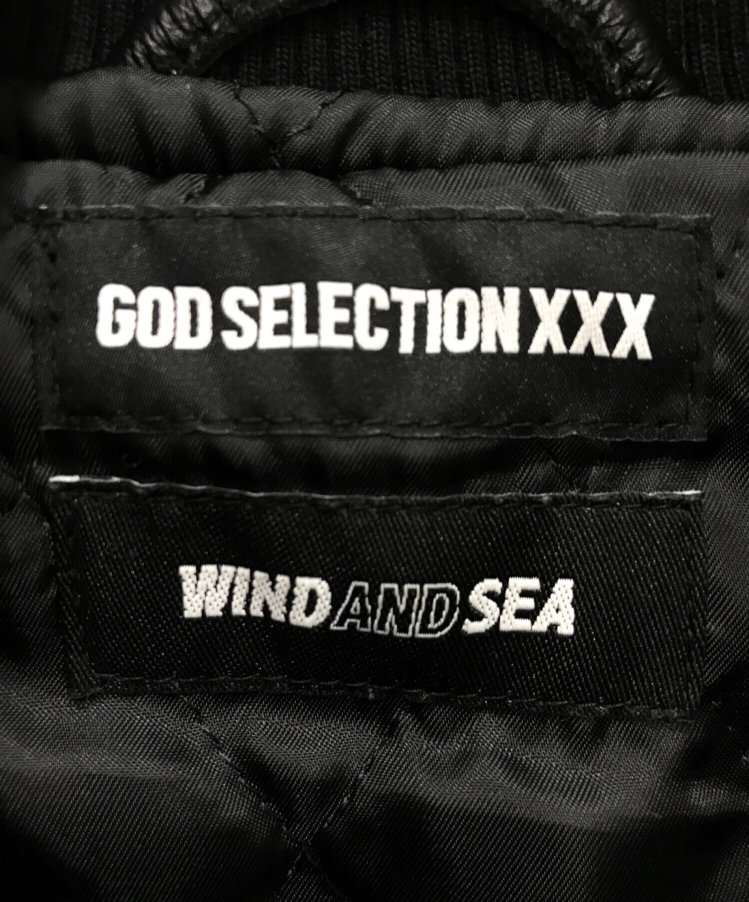 WIND AND SEA (ウィンダンシー) GOD SELECTION XXX (ゴッドセレクショントリプルエックス) コラボスタジャン ブラック  サイズ:L