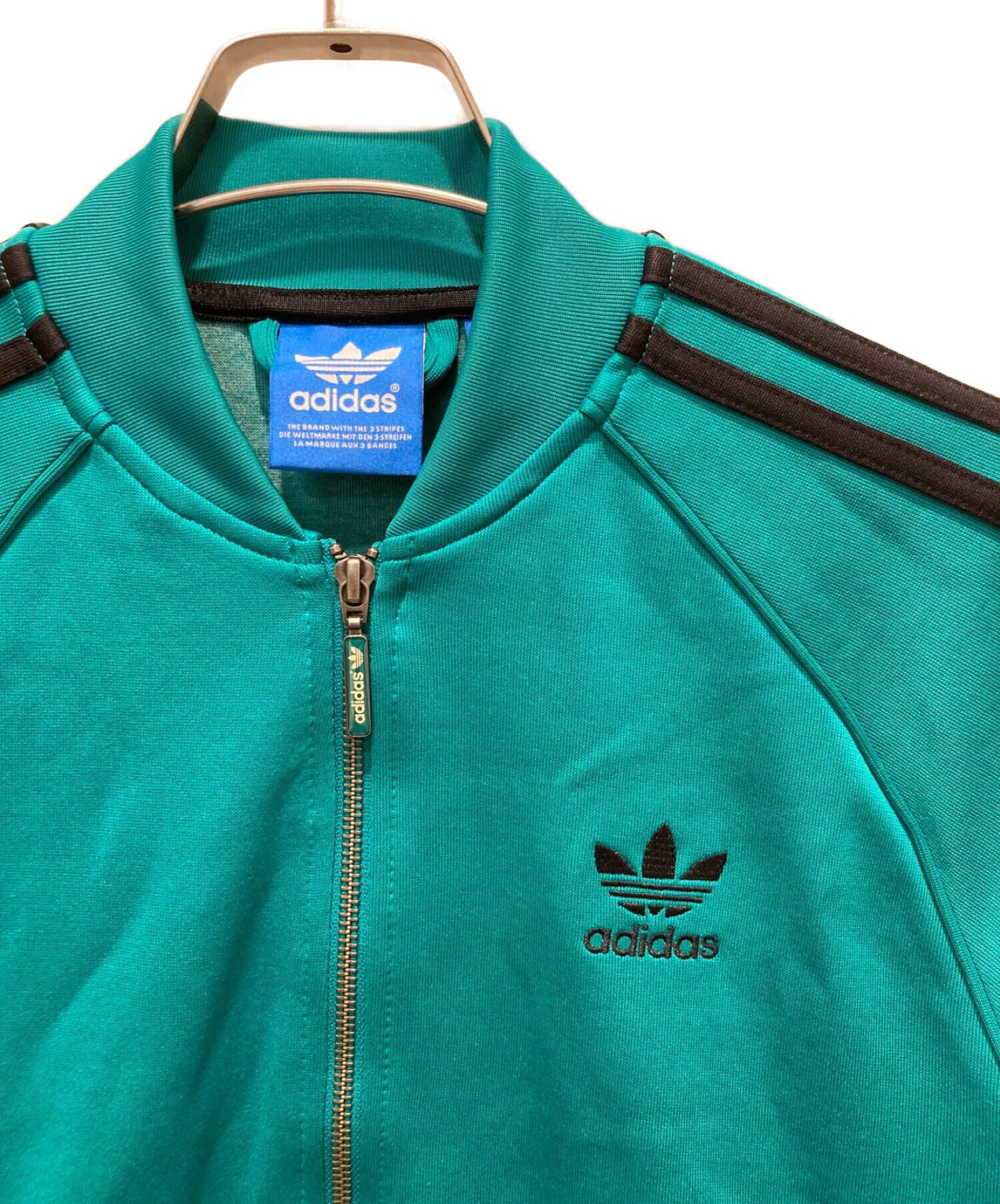 Adidas superstar clearance track jacket green