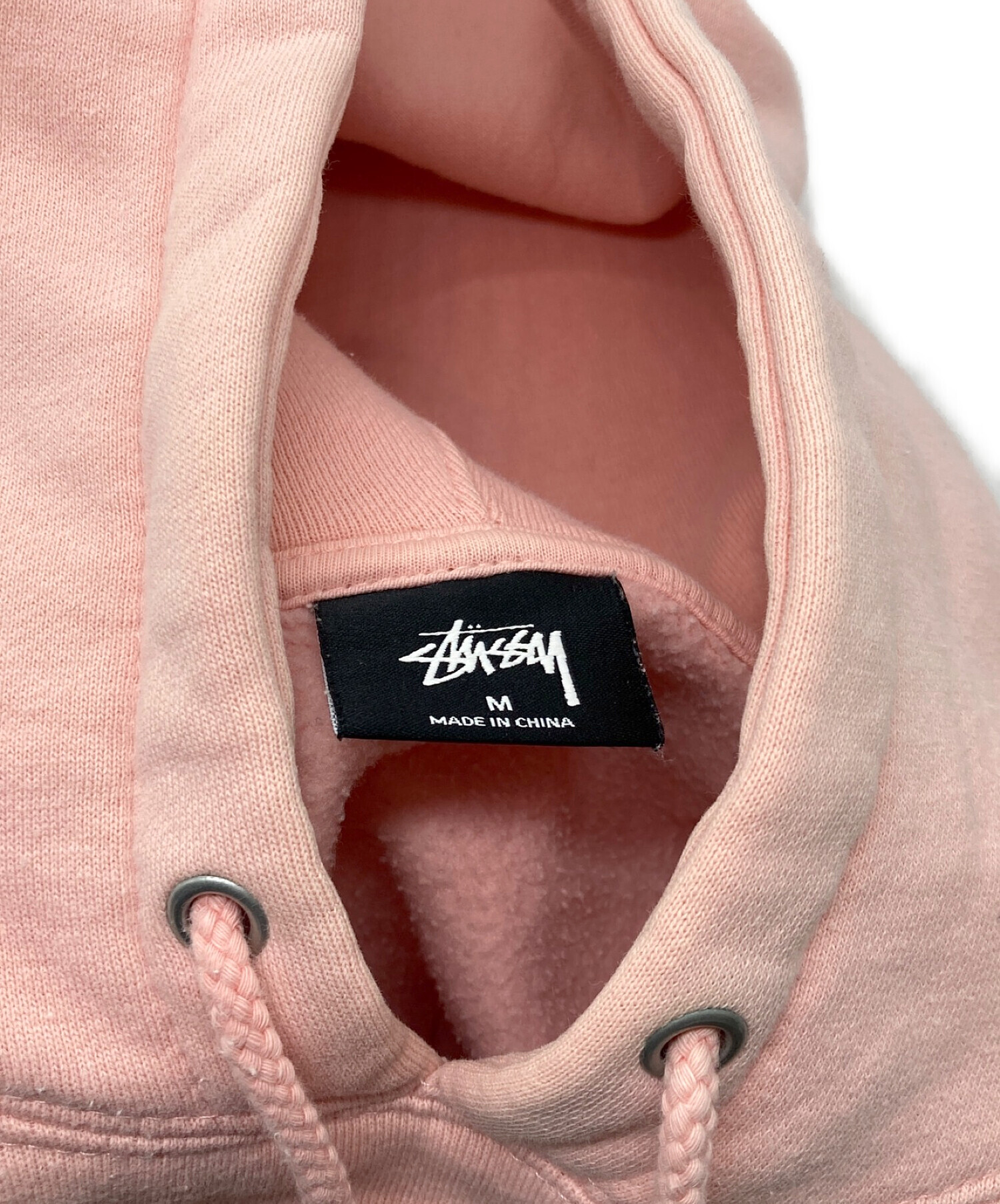 中古・古着通販】stussy (ステューシー) パーカー ピンク サイズ:M