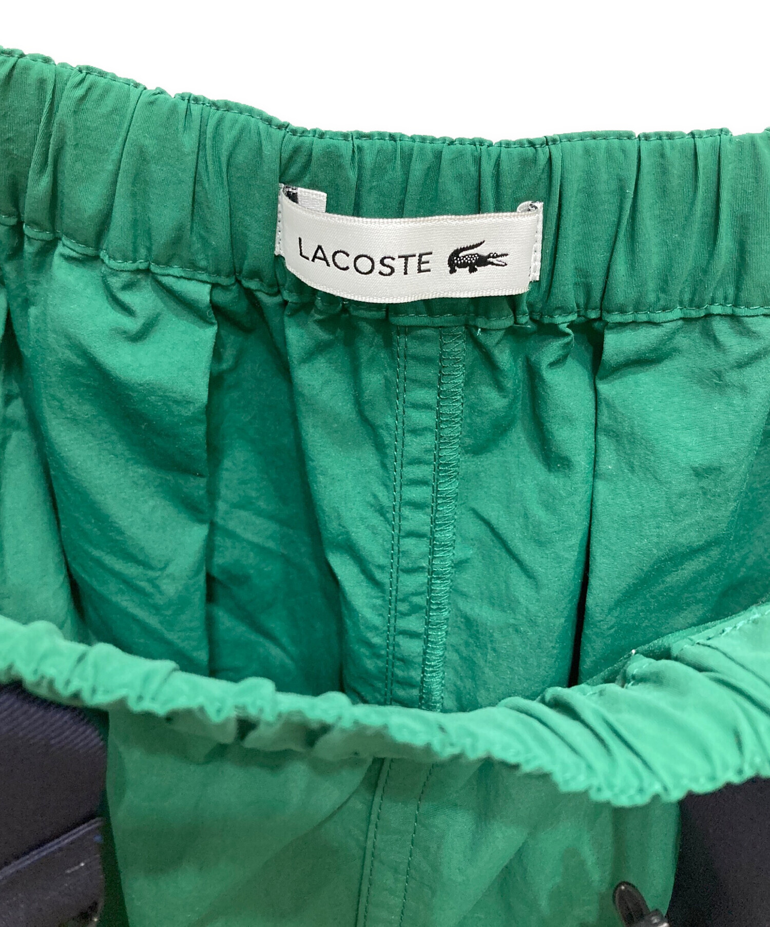 中古・古着通販】LACOSTE (ラコステ) 撥水ナイロンマキシフレアスカート グリーン サイズ:M｜ブランド・古着通販 トレファク公式【TREFAC  FASHION】スマホサイト