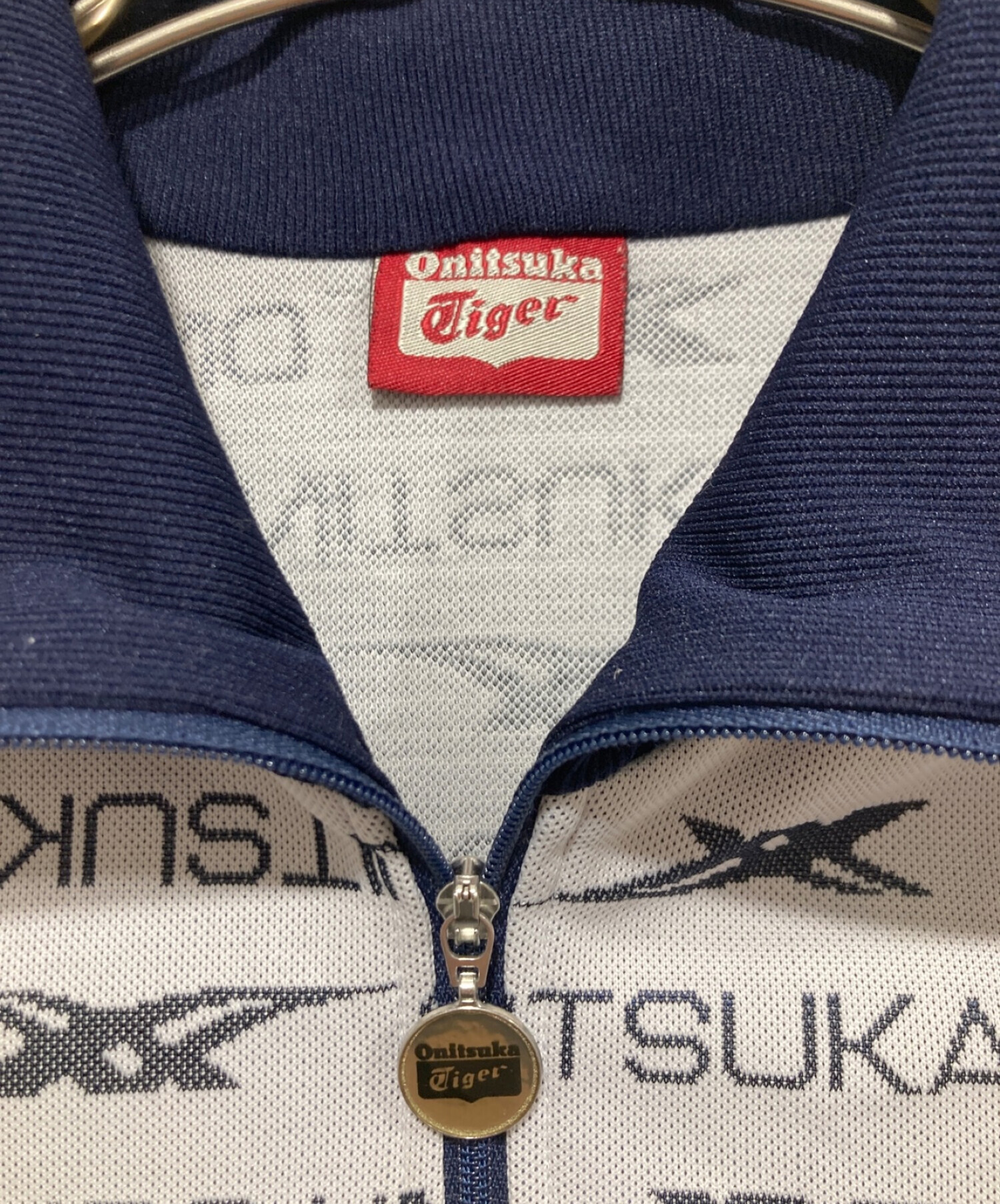 Onitsuka Tiger (オニツカタイガー) 総柄ロゴトラックジャケット ネイビー×ホワイト サイズ:M