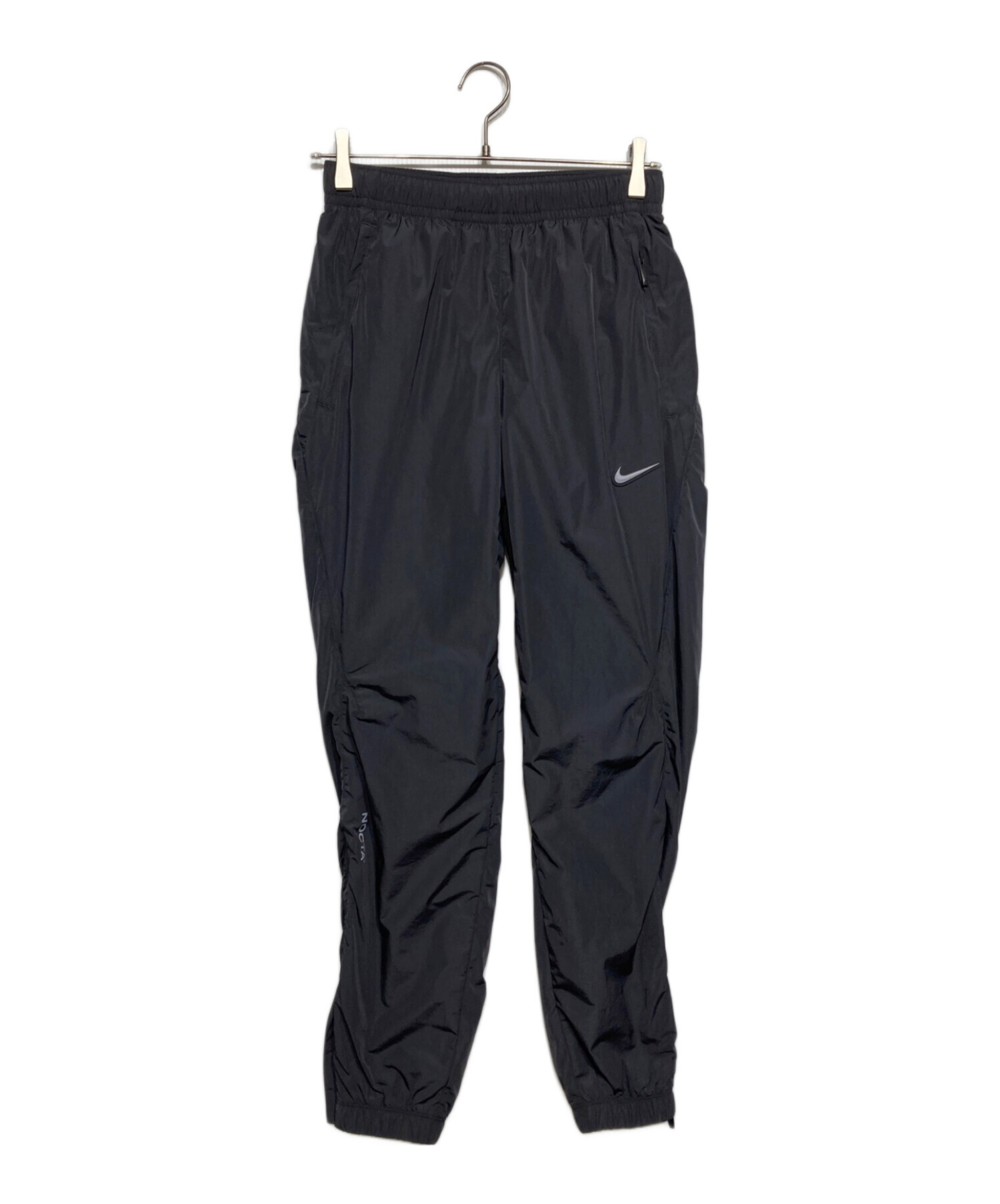 NIKE (ナイキ) NOCTA (ノクタ) NRG NOCTA CS TRK PANT グレー サイズ:XS